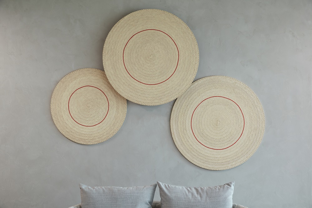 Bed with three circle patterns on the wall for Mental Health Blog
