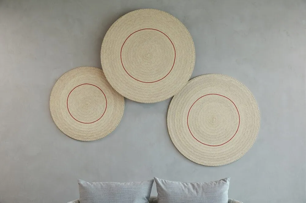 Bed with three circle patterns on the wall for Mental Health Blog