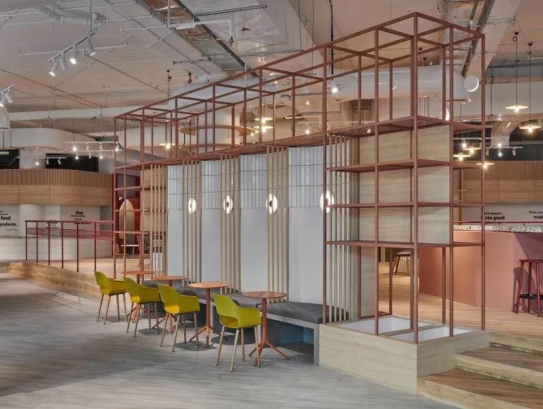 Semi-private dining pods at Picnic Square featuring warm timber finishes, modern lighting, and sustainable F&B fit-out elements by Summertown Interiors.