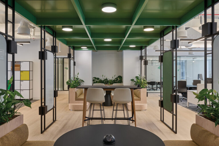 Sustainable office fit-out for Schneider Electric in Dubai, featuring bespoke joinery, open collaboration areas, and eco-conscious materials