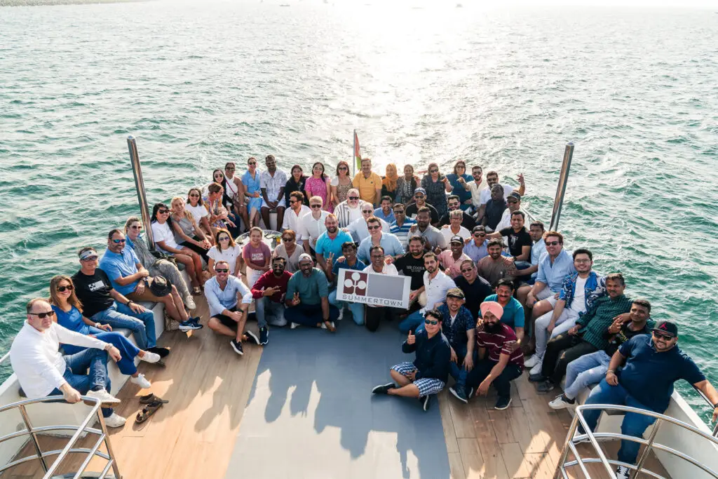 Summertown team on a boat during a team building event