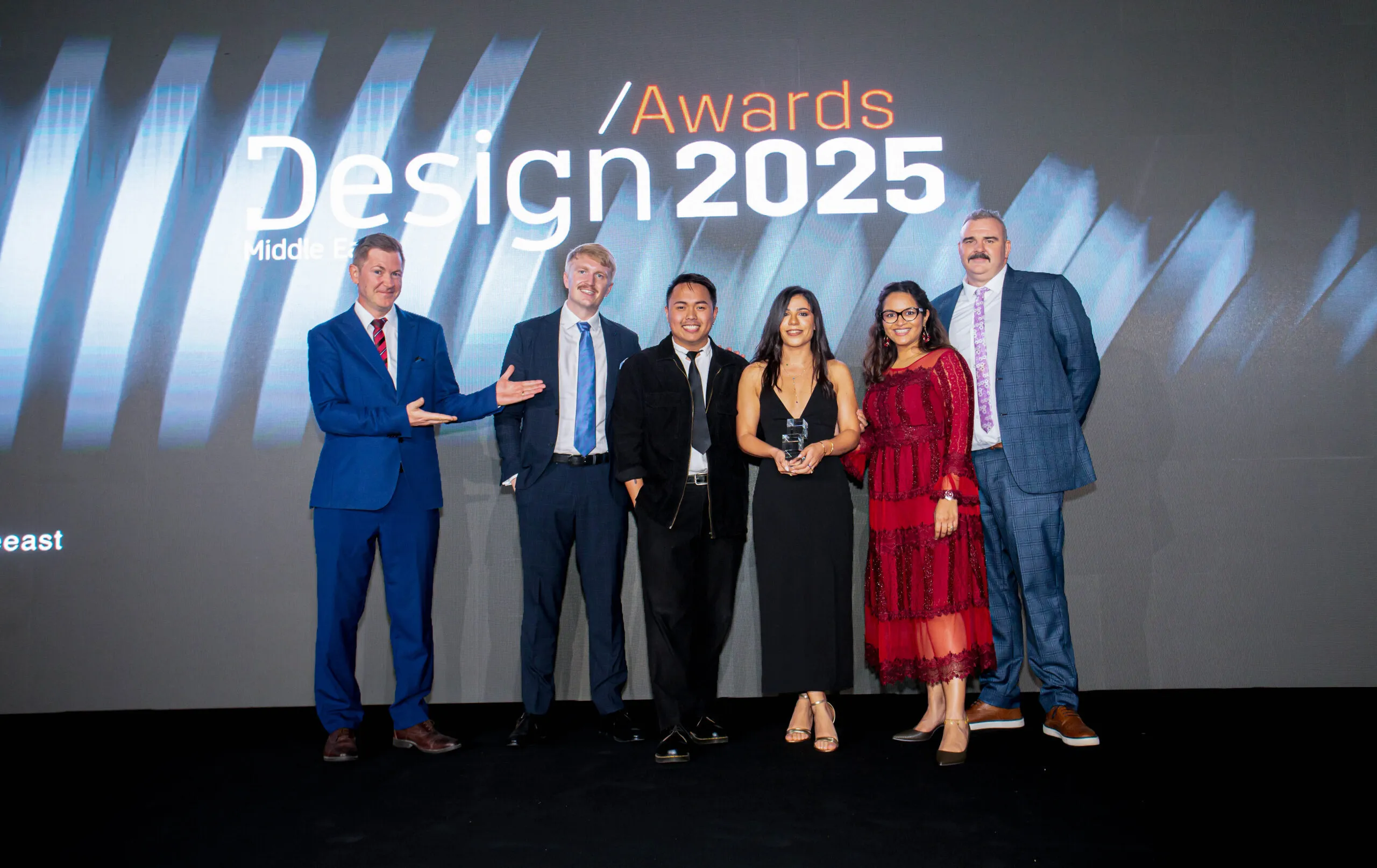Summertown Interiors team on stage receiving the Sustainable Project of the Year award at the 2025 Design Middle East Awards in Dubai