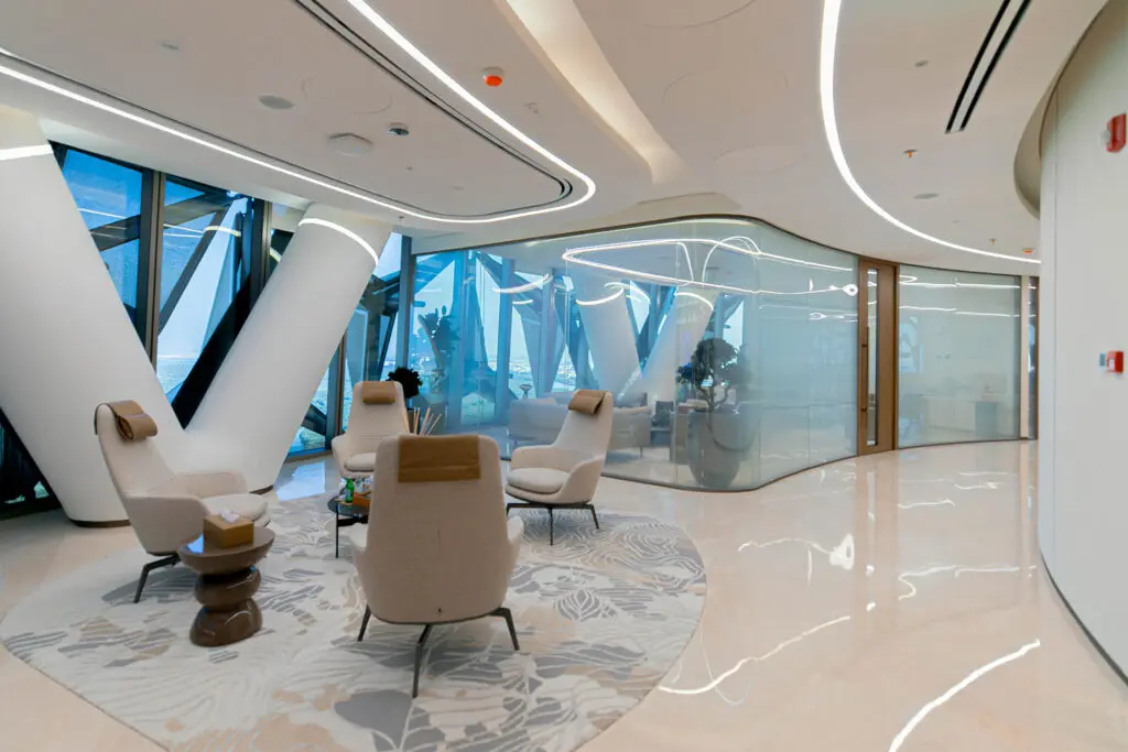 Flexible open-plan office fit-out for Abu Dhabi Investment Council, with collaboration zones and breakout areas by Summertown Interiors